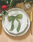 Holiday table placecards in moss green with metallic bow detail for dinners and events