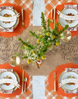 Eco-friendly kraft paper table runner with ‘Thankful’ design for holiday dining.