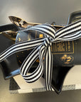 Pre-packaged Halloween gift set with festive treats and décor items