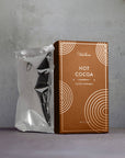 Rich salted caramel hot chocolate in seasonal wrapping, ideal for stockings and baskets.