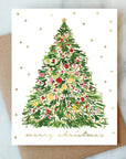 Send festive cheer with the Tinsel Christmas Tree Holiday Card. Hand-painted design, A2 size, optional gold foil accents, blank interior, recycled kraft envelope.
