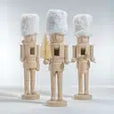 Classic resin nutcracker figurine with white faux fur hat, Christmas home decor accent