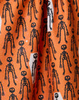 Resting Skeletons Orange Tea Towel