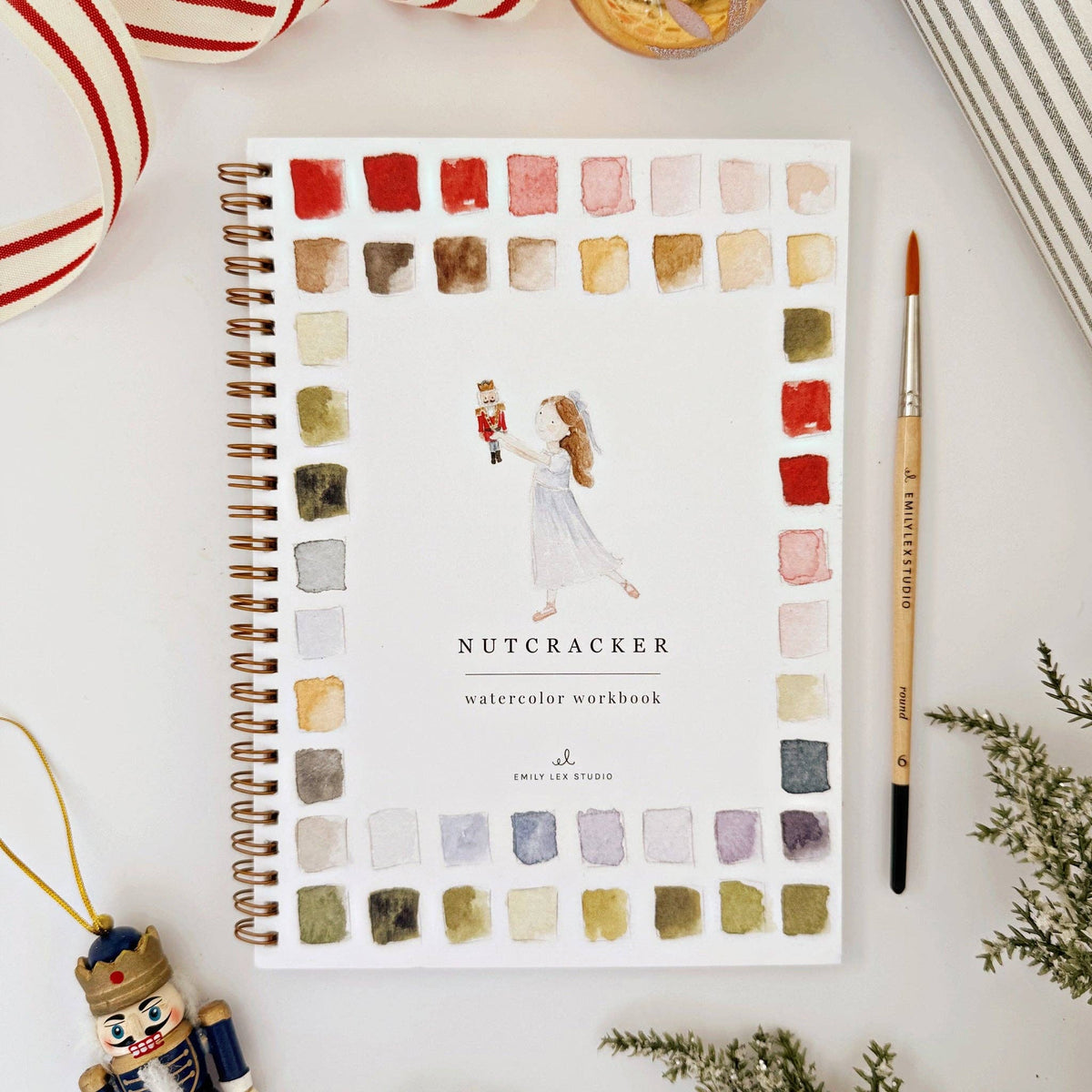 Nutcracker Watercolor Workbook featuring step-by-step holiday illustrations for beginners and artists.