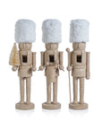 15-inch resin nutcracker with white fur hat in assorted poses, elegant holiday mantel decoration