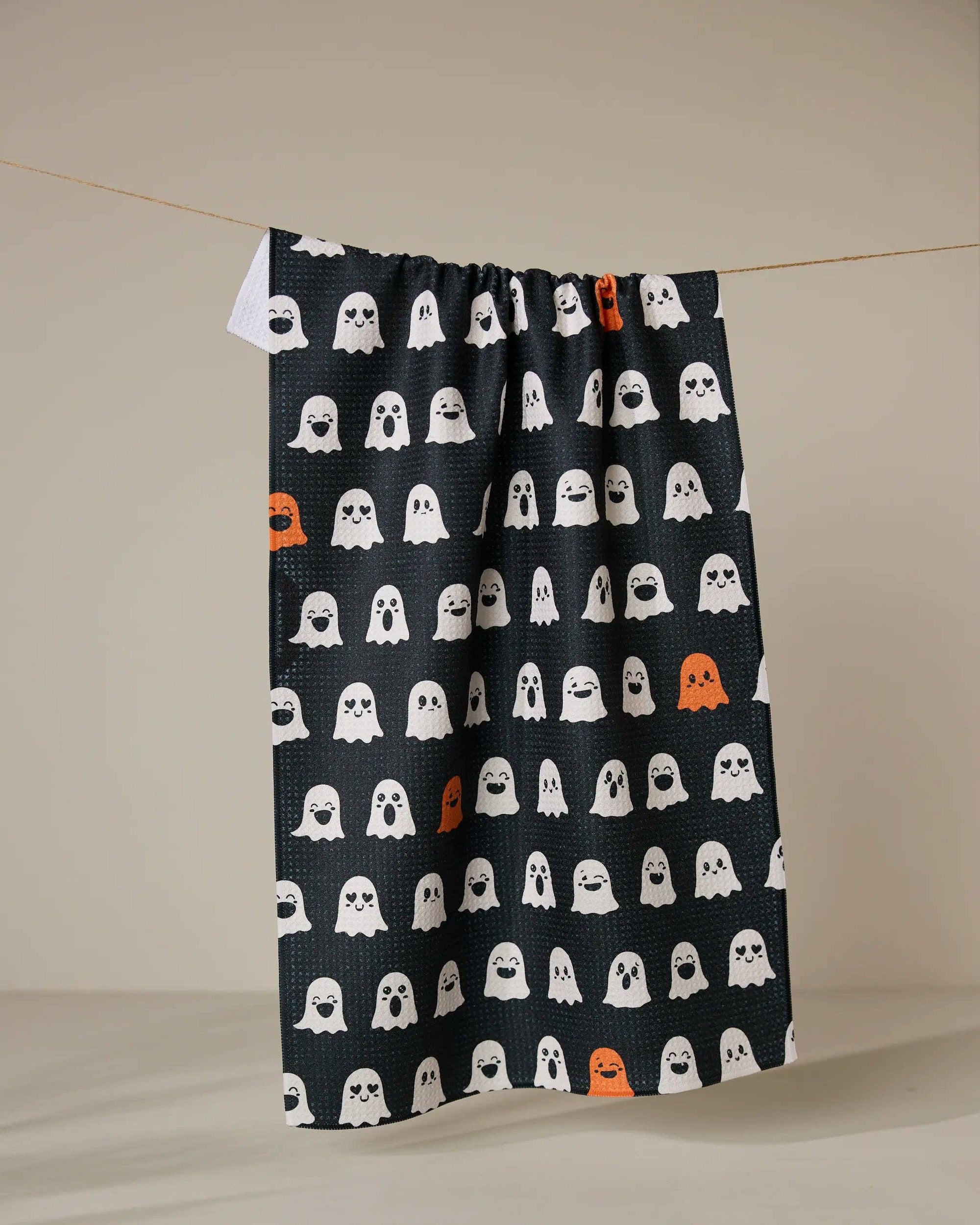 Emotional Boos Kitchen Tea Towel made from recycled materials hanging in kitchen