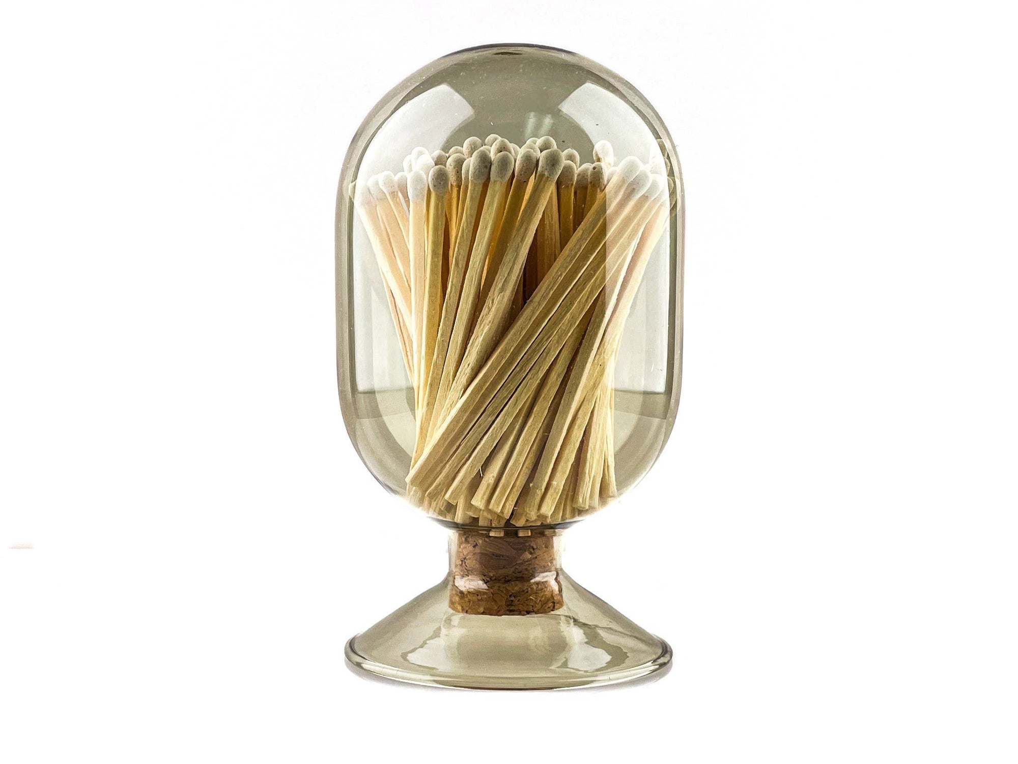 Glass cloche holding decorative safety matches in apothecary jar