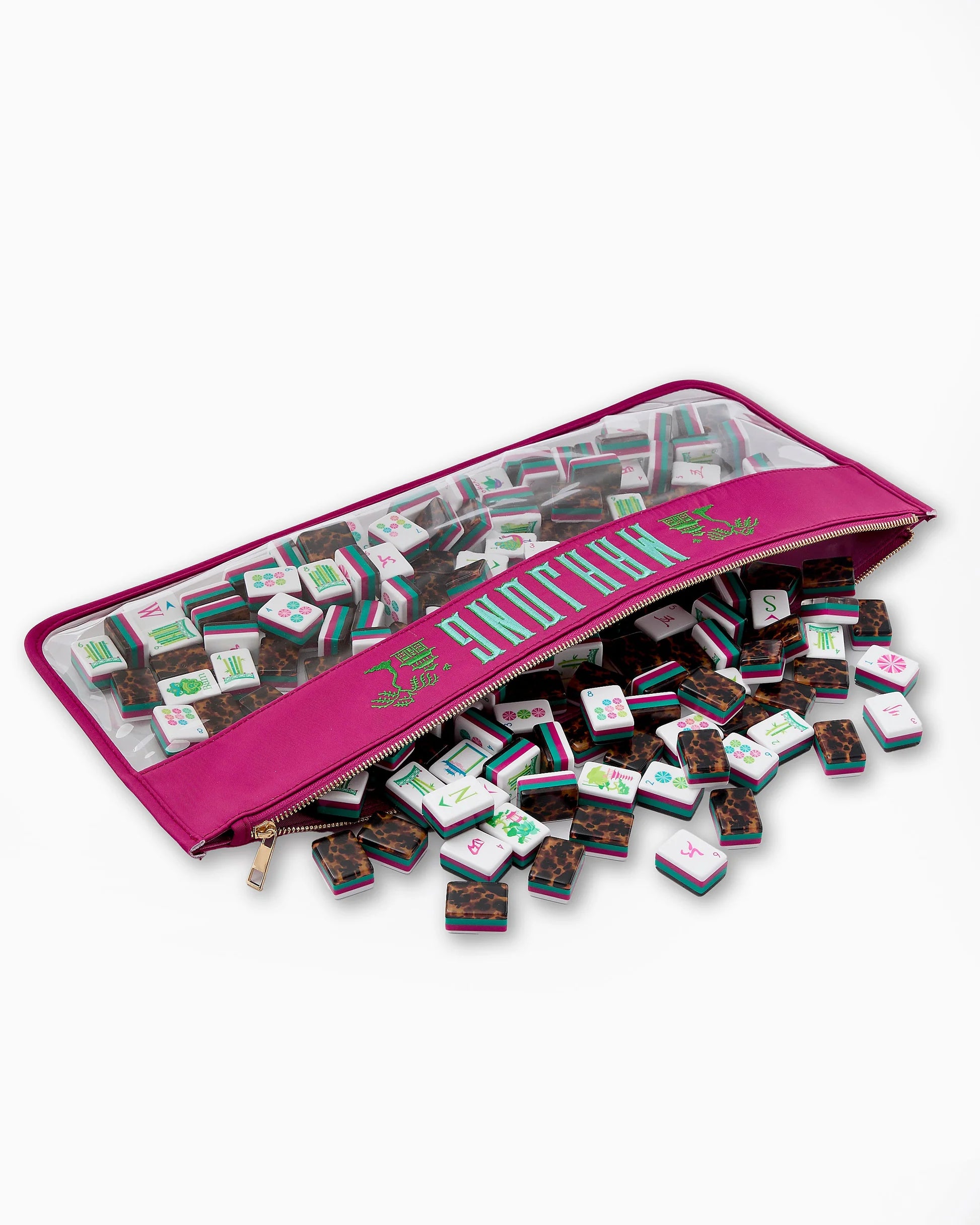 Pink carrying case with transparent lid containing small square items on a white background