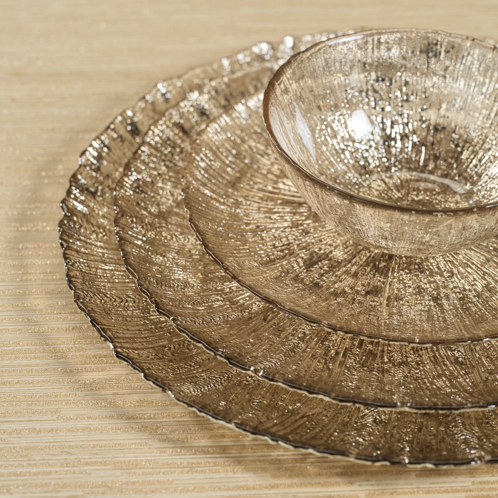 Handcrafted golden and silver fusion glass bowl for elegant tabletop serving