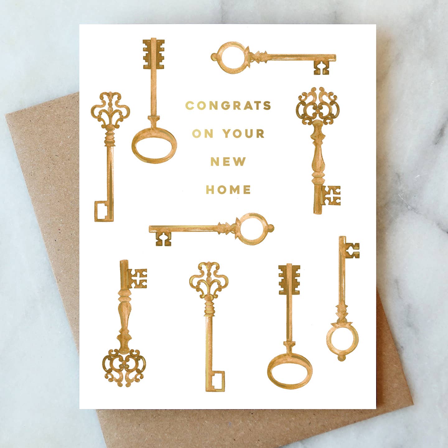 Hand-painted Keys Welcome Home greeting card with gold foil accents