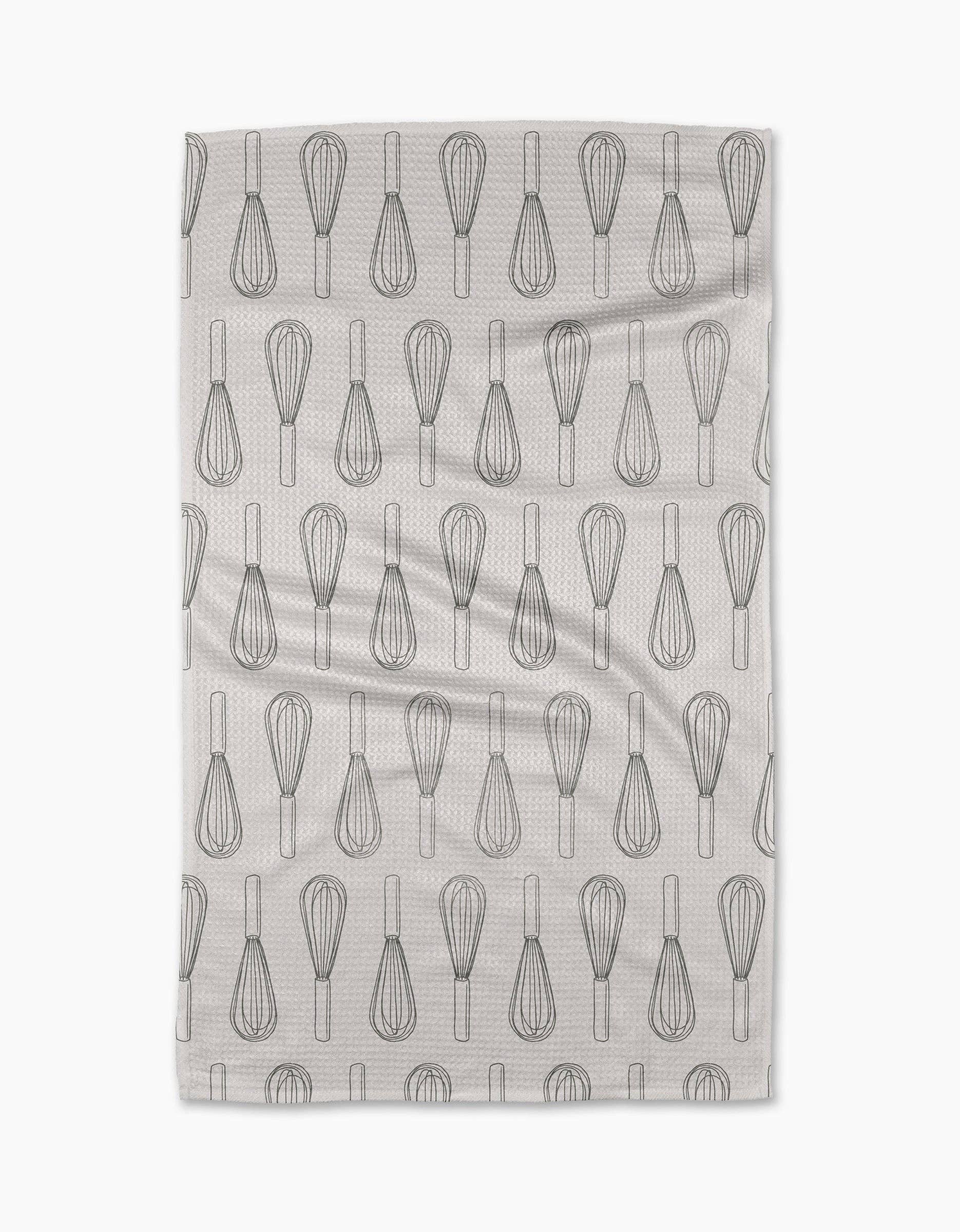 Kitchen Whisks Tea Towel made from recycled materials hanging in modern kitchen