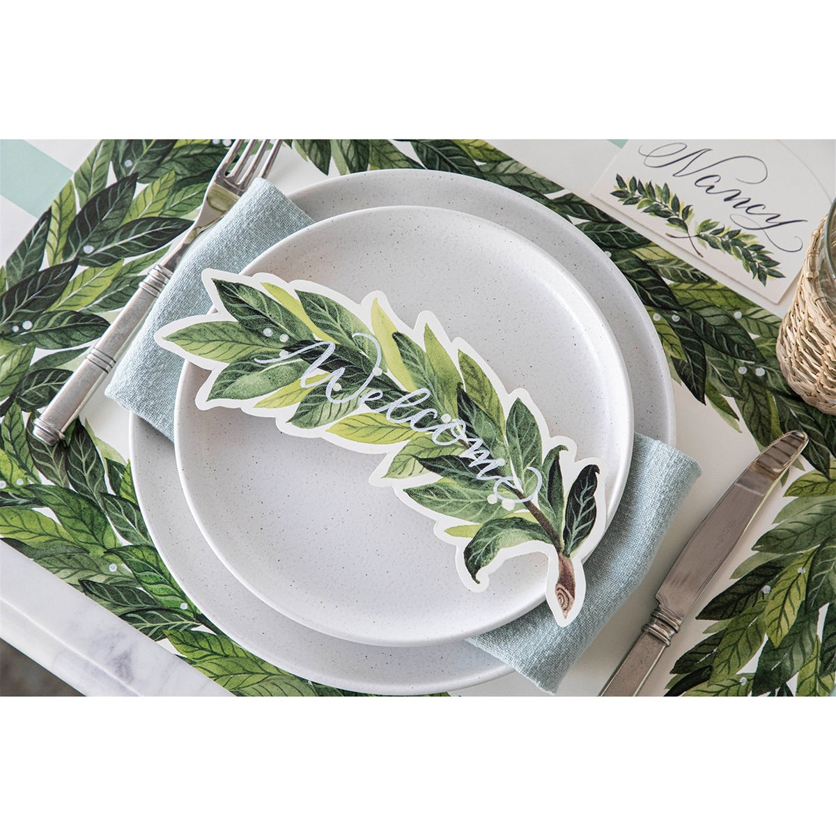 FSC-certified recycled paper table accents with laurel design for holiday or event styling
