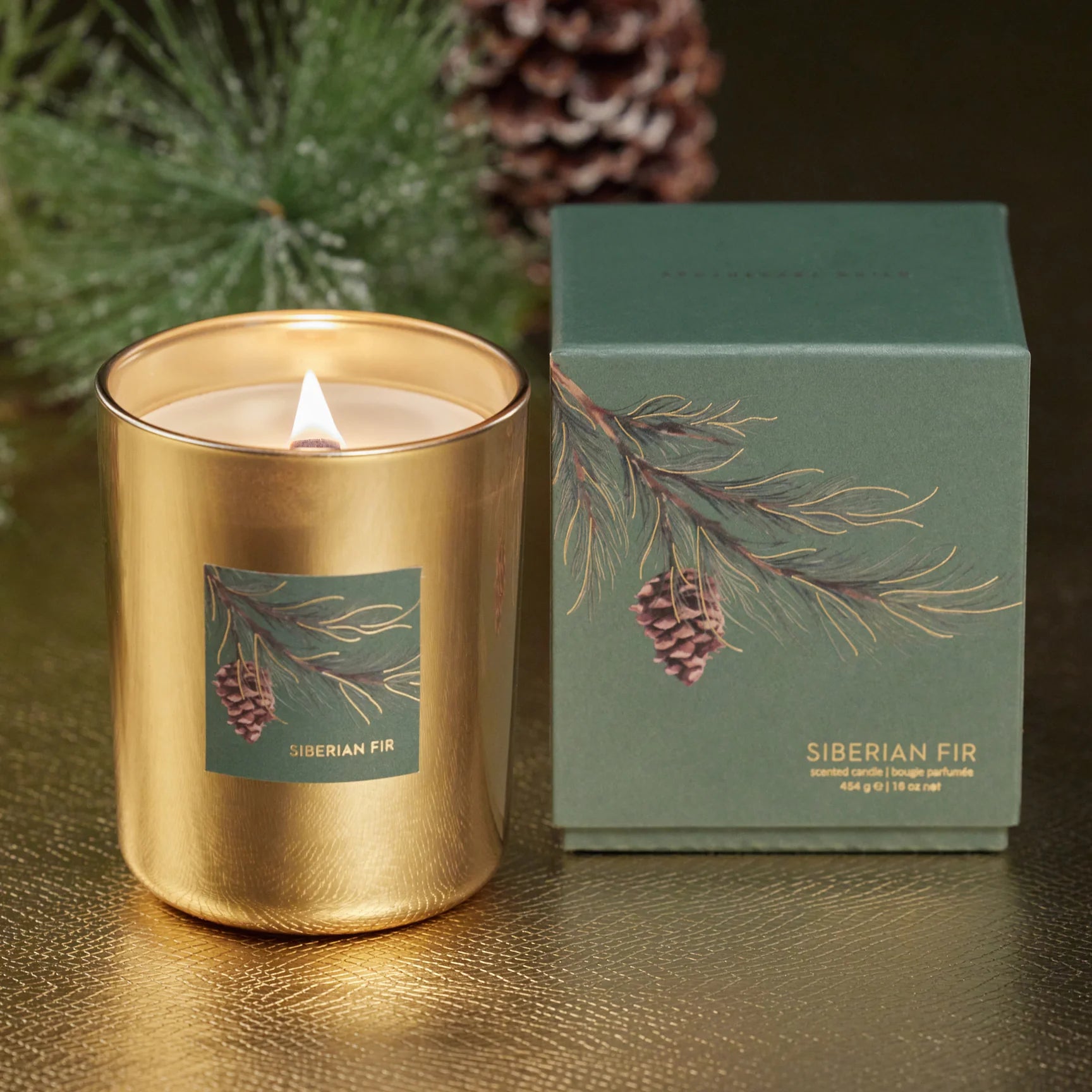 16 oz Siberian Fir candle in gold wood wick, cedarwood and pine scent in gift box