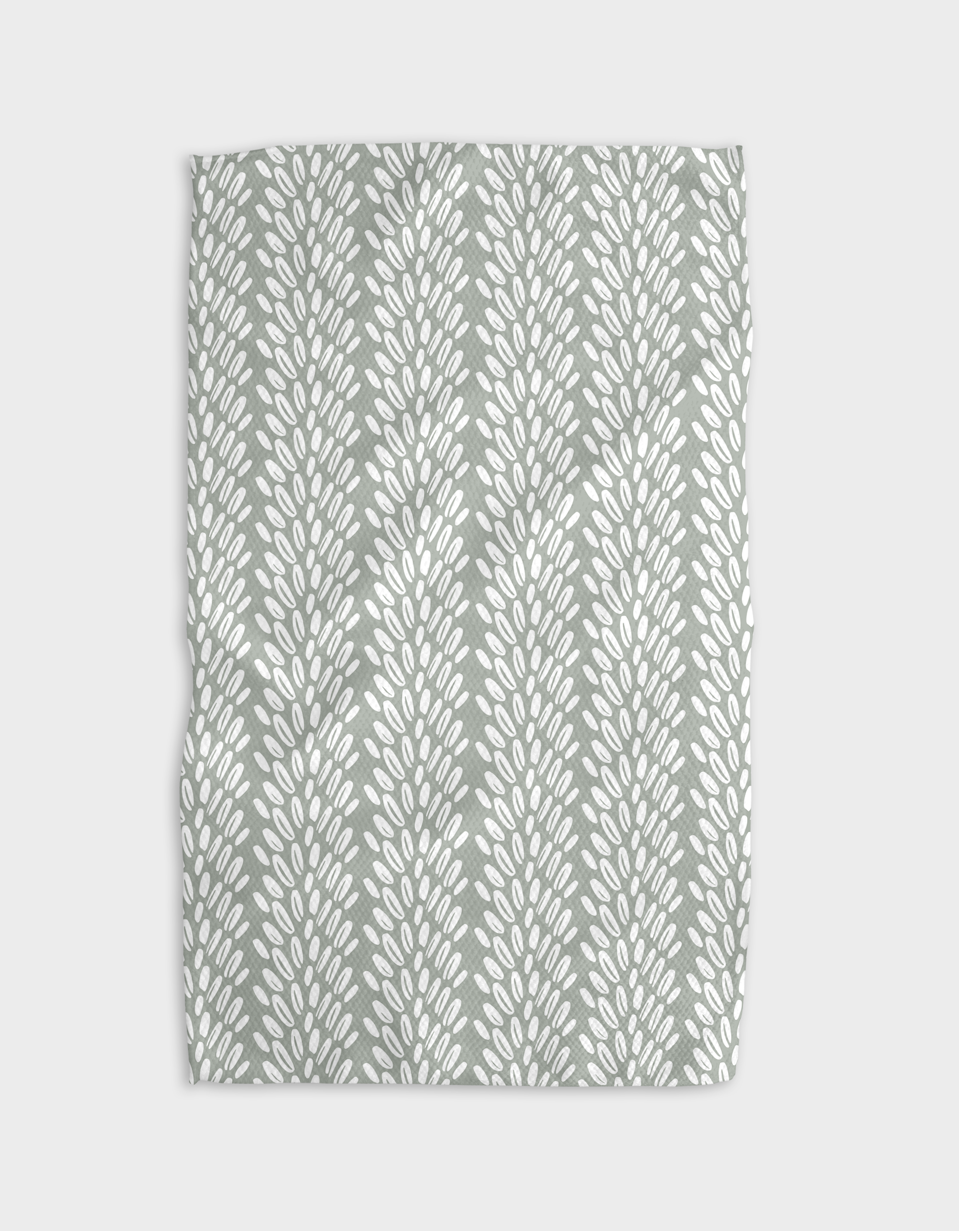 Seed Kitchen Tea Towel made from recycled polyester hanging in modern kitchen
