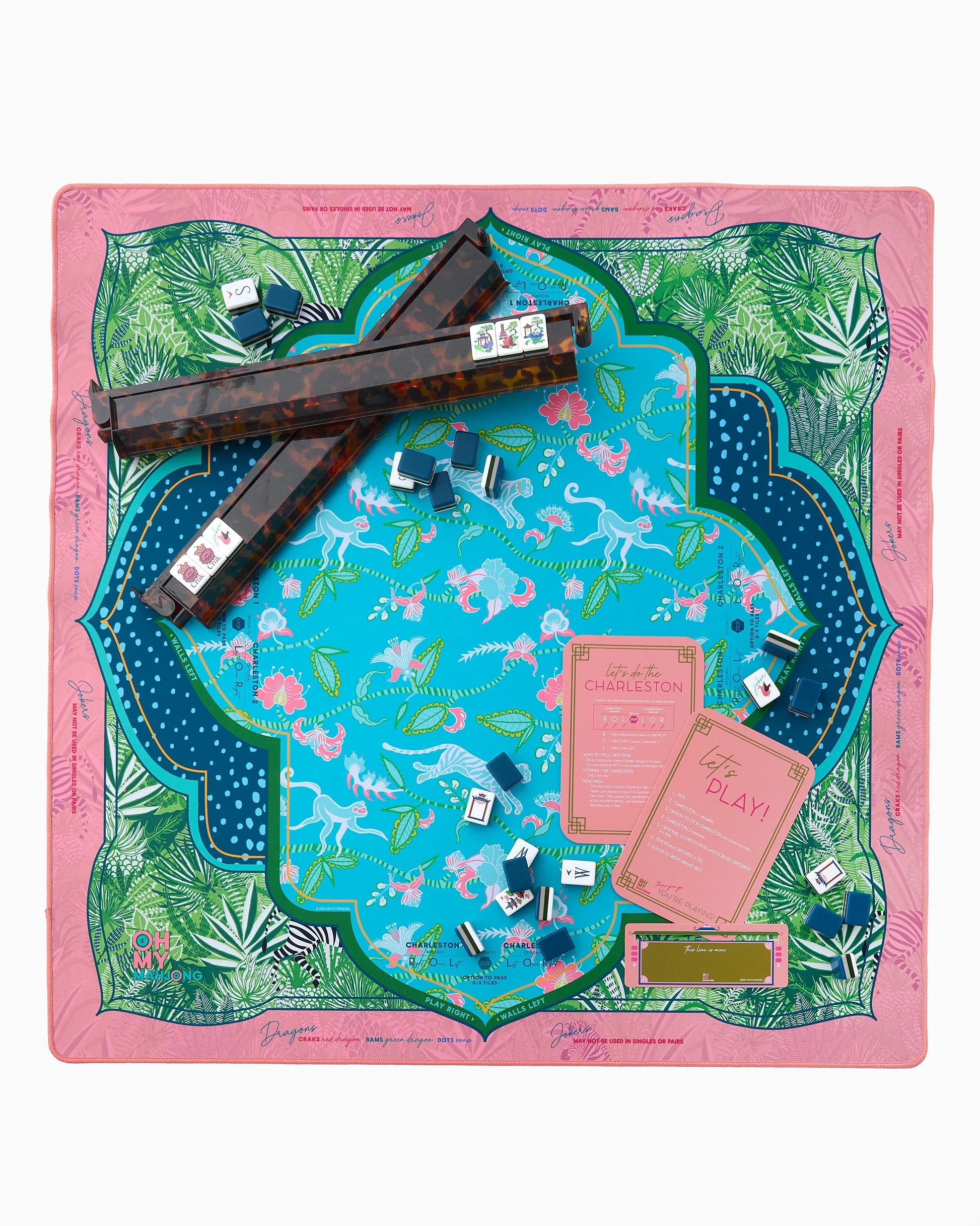 Board game set on a colorful board with pink border