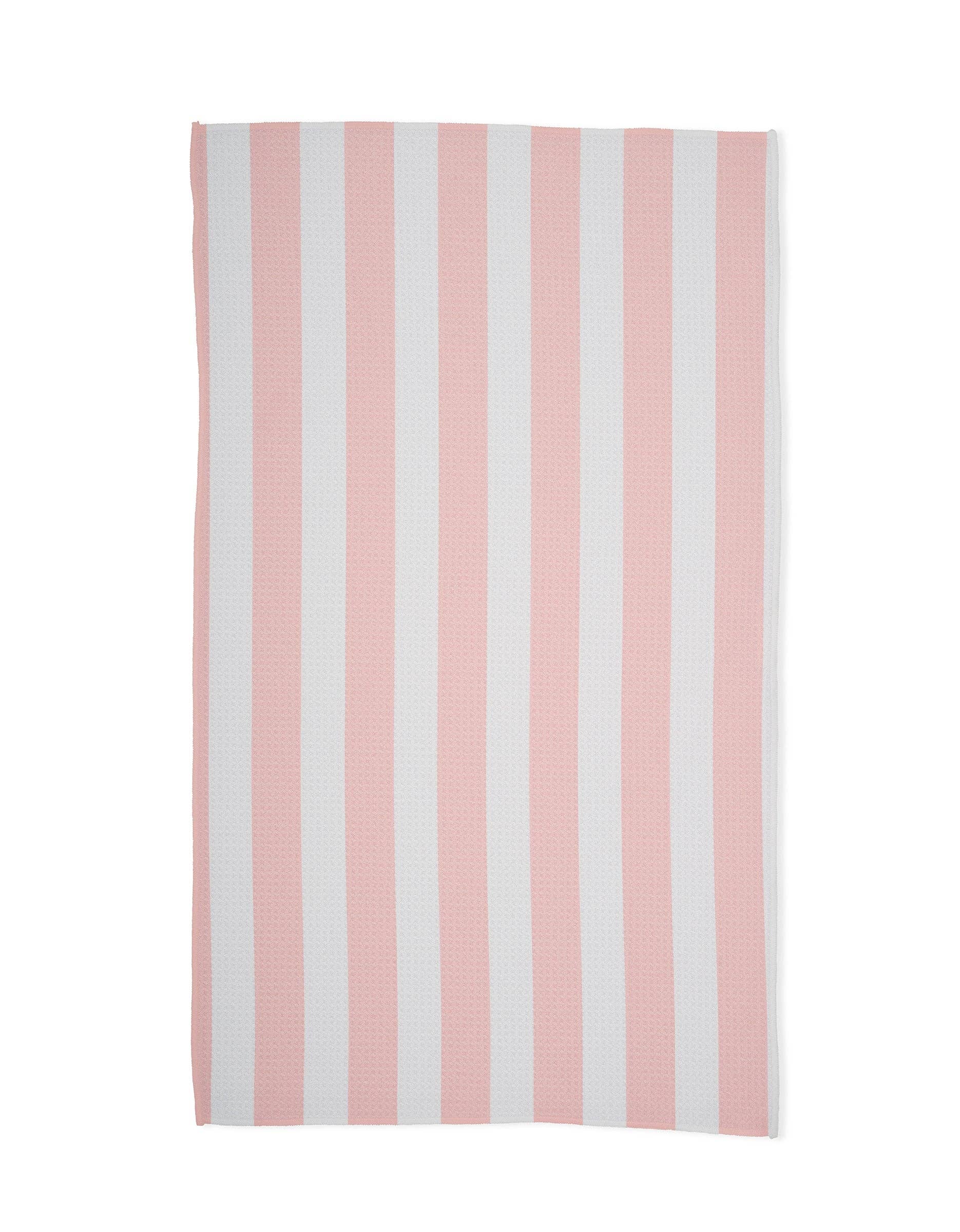 Summer Bold Pink Tea Towel made from recycled materials hanging in kitchen