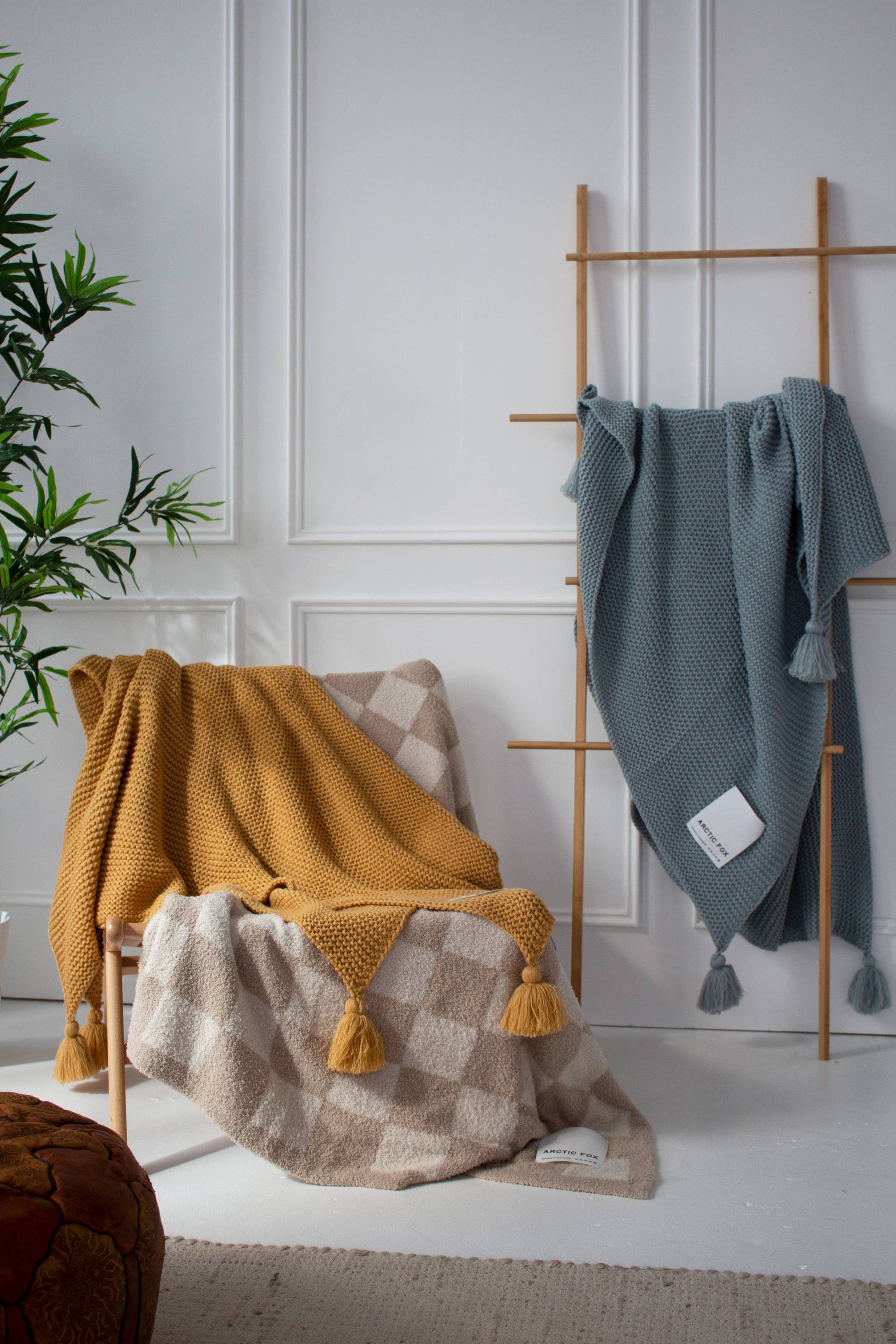 Soft checkered teddy blanket with plush texture, perfect for cozy winter nights